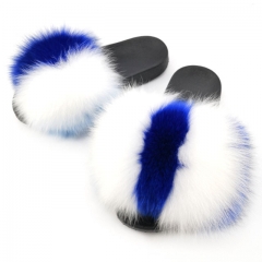 white and blue strip fox fur slides